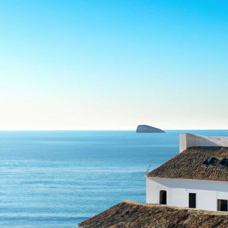 Two couples exploring the vibrant streets of Ibiza, Spain, during their 5-day winter escape, discovering the island's captivating blend of history, culture, and nightlife.